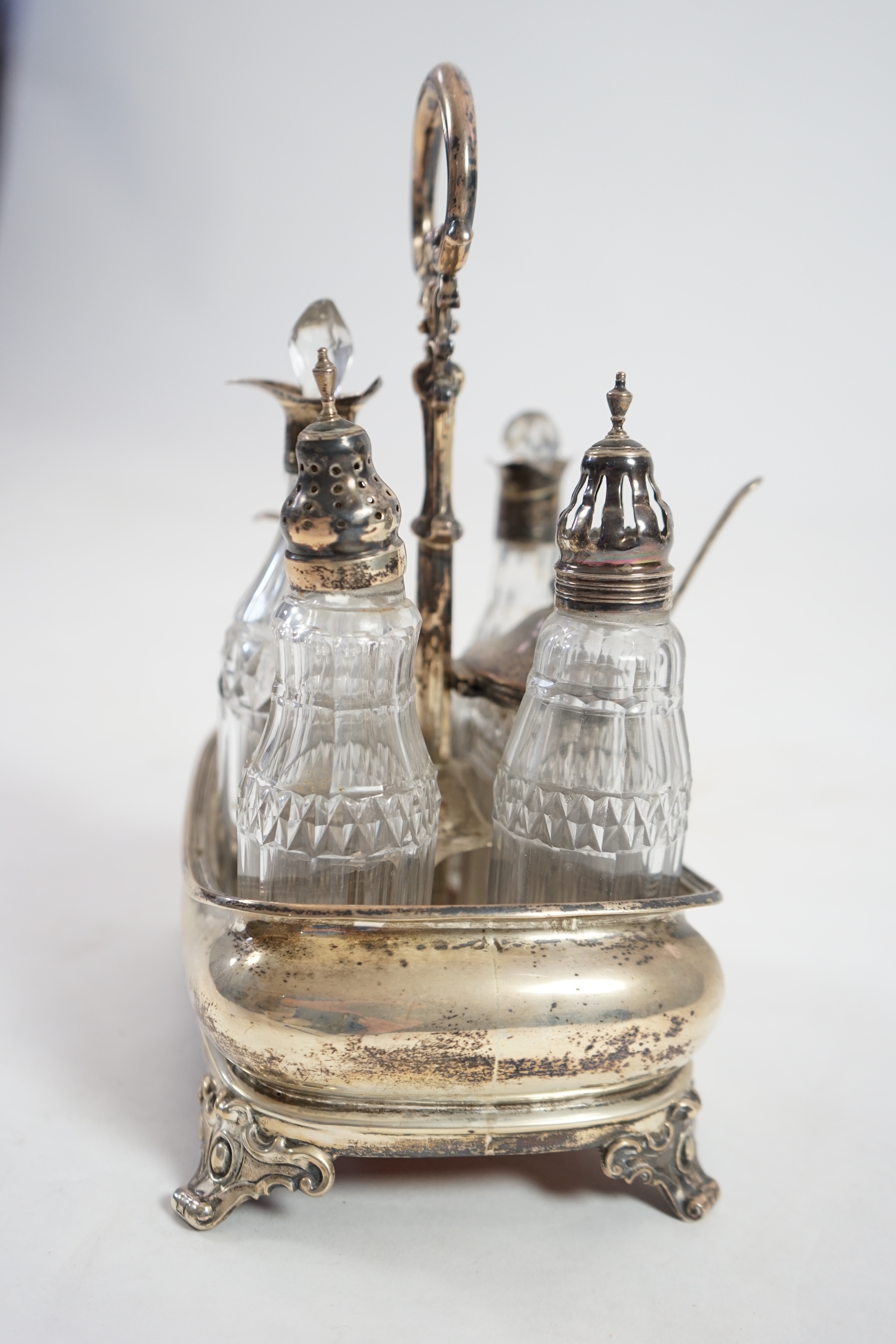 An early 19th century silver cruet stand